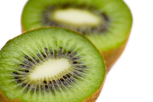 Kiwi halves isolated on a white background.