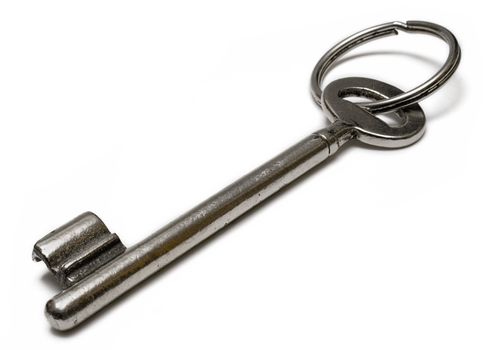 Cellar key with ring isolated on a white background.