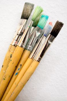 Dirty paint brushes.