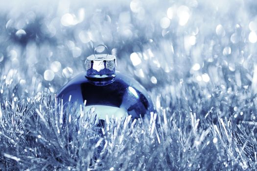 blue christmas ball on holiday background