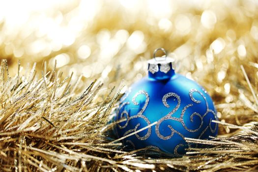  blue christmas ball on golden background