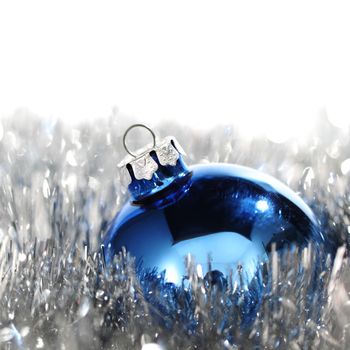 blue christmas ball on silver background