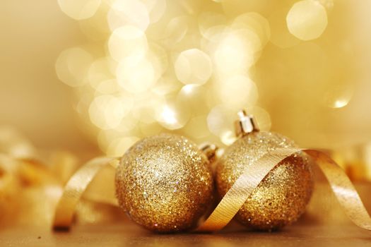 golden christmas ball on golden bokeh background