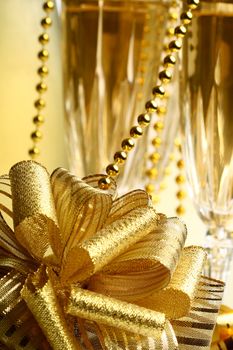 holiday card golden champagne and gift