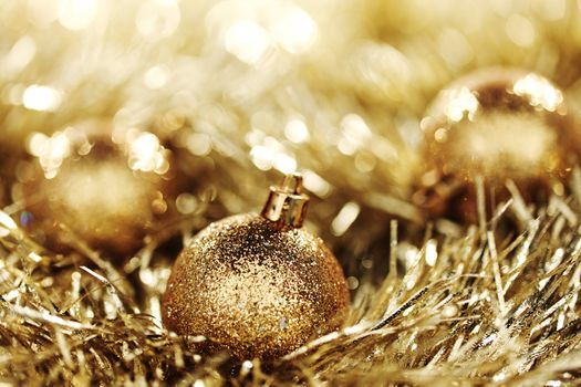 golden christmas ball on christmas background
