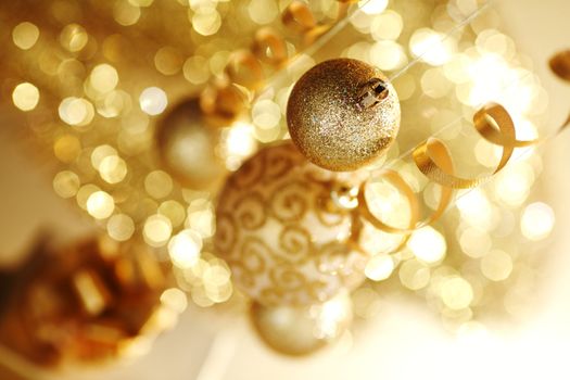 golden christmas balls on bokeh background