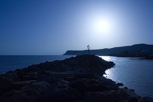 Blue tinted sunset at the coast.