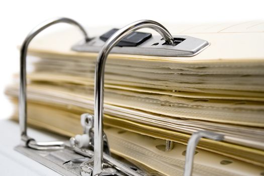 Close-up on an open ring binder isolated on a white background.