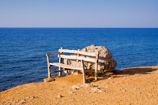 Empty bench at the sea.