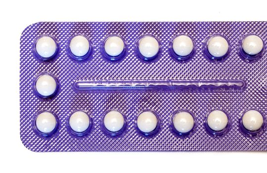 Blister pack of birth control pills. Isolated on a white background.