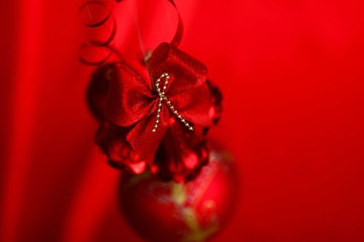  christmas balls on red satin background