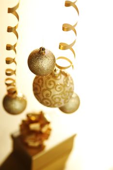 golden christmas balls on bokeh background