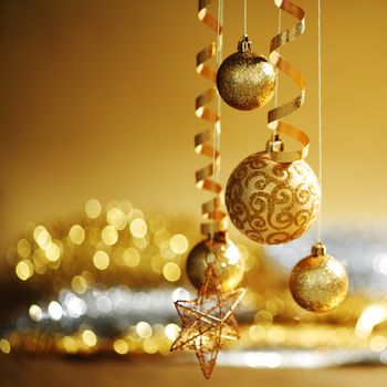 golden christmas balls on bokeh background