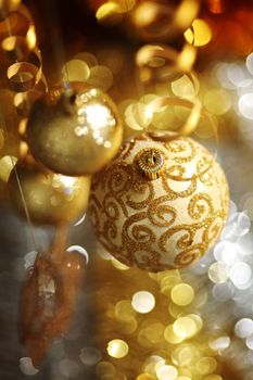 golden christmas balls on bokeh background