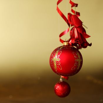  red christmas balls on gold  background