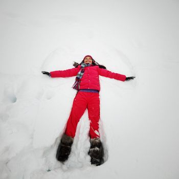 winter woman lay on snow