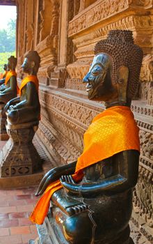 Row of Buddha in Laos temple