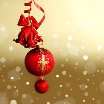  red christmas balls on gold  background