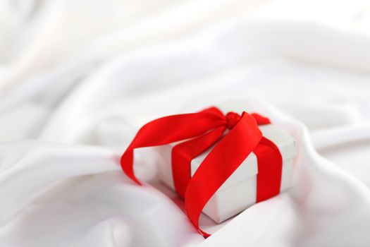  christmas gift on white silk background