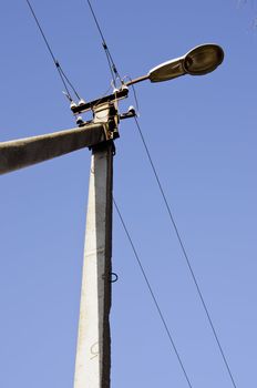 Concrete electric poles in rural areas. Power supply industry.