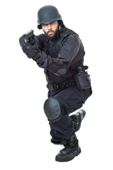 a swat agent wearing a bulletproof vest and aiming with a gun