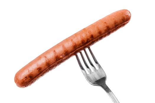 a delicious sausage on a fork over white