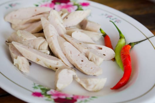 white pork sausage served with fresh chili