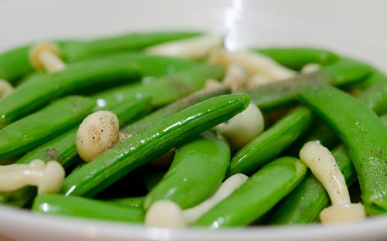 close up stir fried vegetables , pea and mushroom