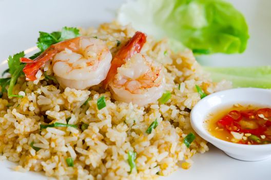 fried rice and shrimp  served with spicy sauce and fresh vegetable