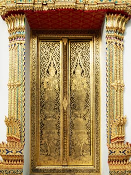 Thai art gold painting on church wood door Bangkok Thailand