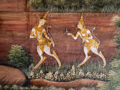 Thai art style Painted on a Temple Wall at Grand Palace, Bangkok, Thailand