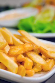  french fries on  white plate , fast food
