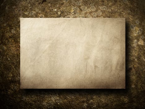 Texture of old paper on brown stone background