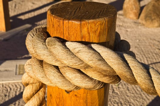 Large rope plaited on a post