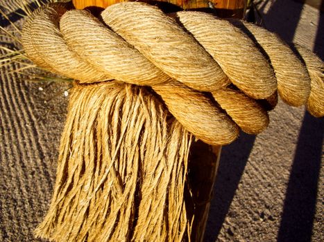 Fringed rope on a post