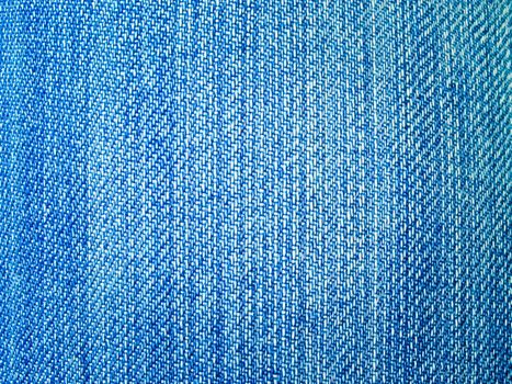 Background of dark blue jeans fabric