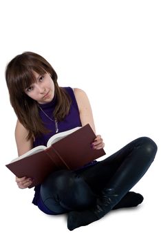 Cute girl reading a book isolated on white