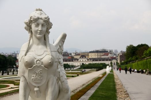 A statue with bare breasts in Belvedere park, Vienna, Austria