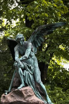 Lonely angel protecting a grave on Vienna's central cemetery