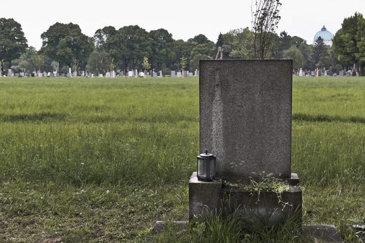 Blank tombstone on a grave in the middle of nowhere on the central cemetery in Vienna, Austria