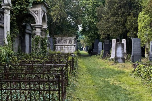 A savaged passage of the jewish part of Vienna's central cemetery symbolizing the lost jewish heritage in Vienna