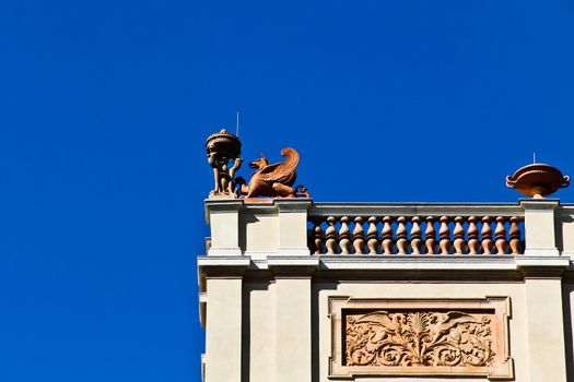 Winged beast guarding an imperial building, being in the shadow