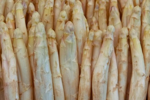 A set of asparagus on a market