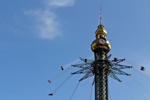 A carousel high up in the sky on a fair in Vienna