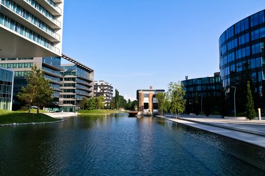 A modern district in Vienna next to an artificial lake