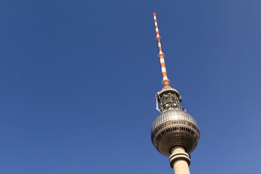 Berlin's broadcasting tower named Alex on blue sky