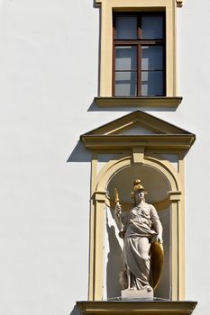 A female warrior in a facade of a public building in Vienna