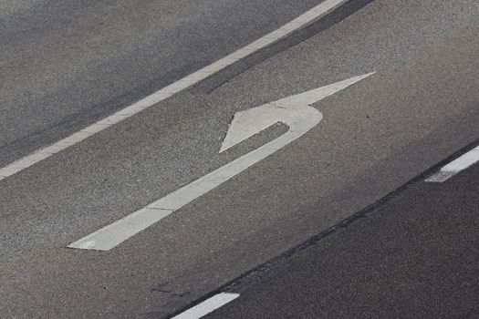 A road sign to turn left on a road lane in the outskirts of Vienna