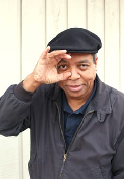 African american male posing outside.