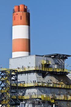 An industrial building with chimney being inactive at the outskirts of Vienna